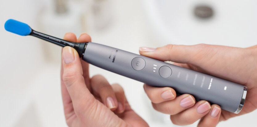 Reiniging van uw Philips Sonicare-tandenborstel