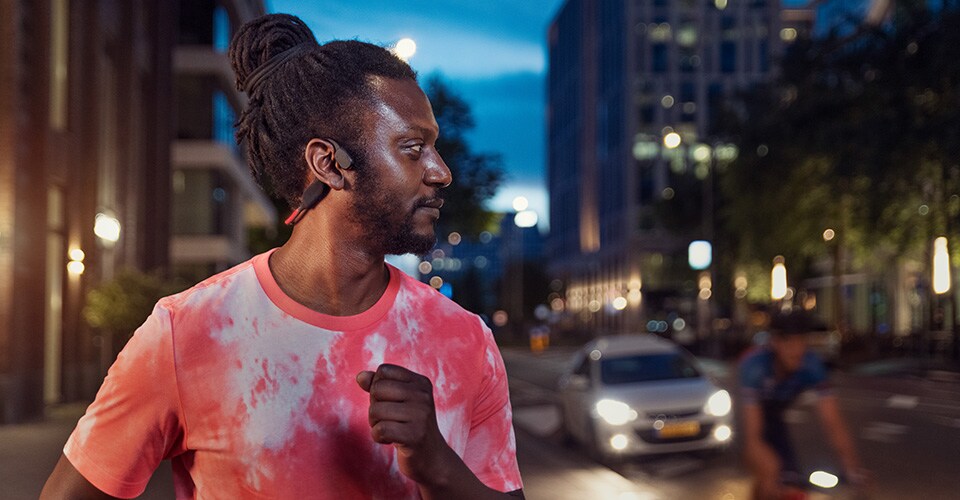 a runner in low light, with the LED lights turned on