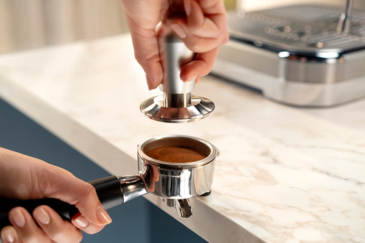 Tassage du café moulu