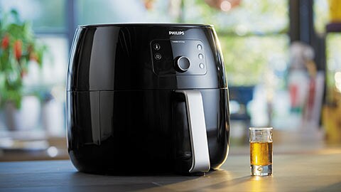 Pour tous les gourmand : Nouvelle friteuse Philips Airfryer XXL, désormais avec système novateur d'élimination de la graisse ; pour un résultat savoureux et croustillant !